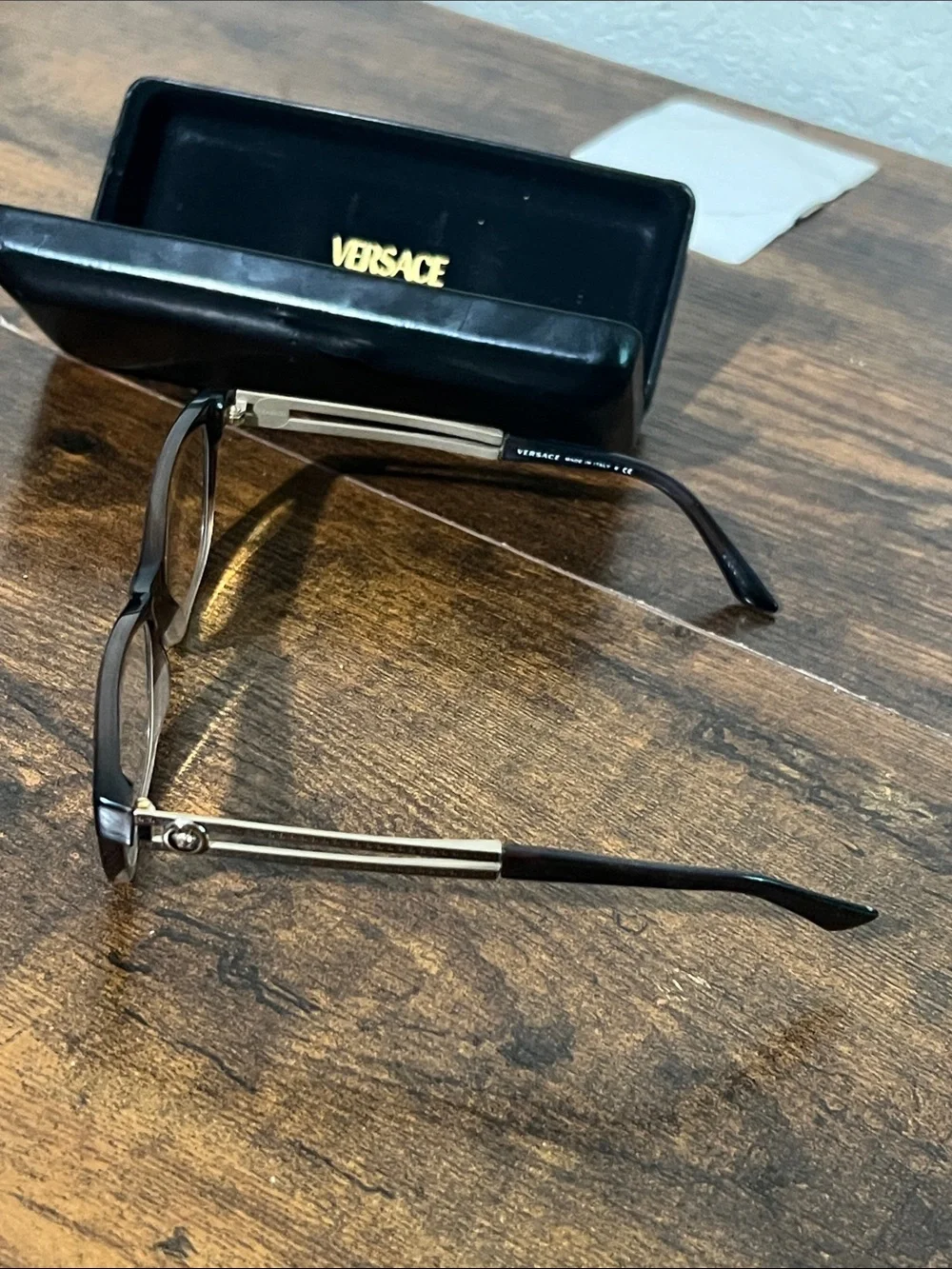 Versace Black Frame Sunglasses with Gold Temples